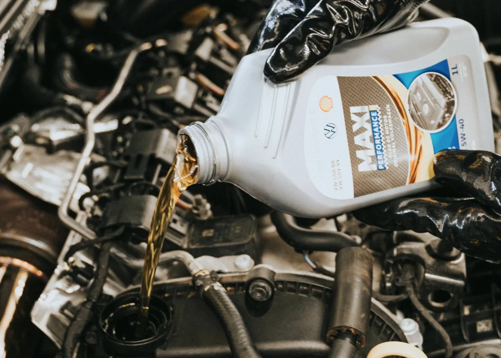 Pouring oil into an engine